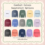 a collection of 12 different colored cotton polyester sweatshirts, each with a unique color and design.