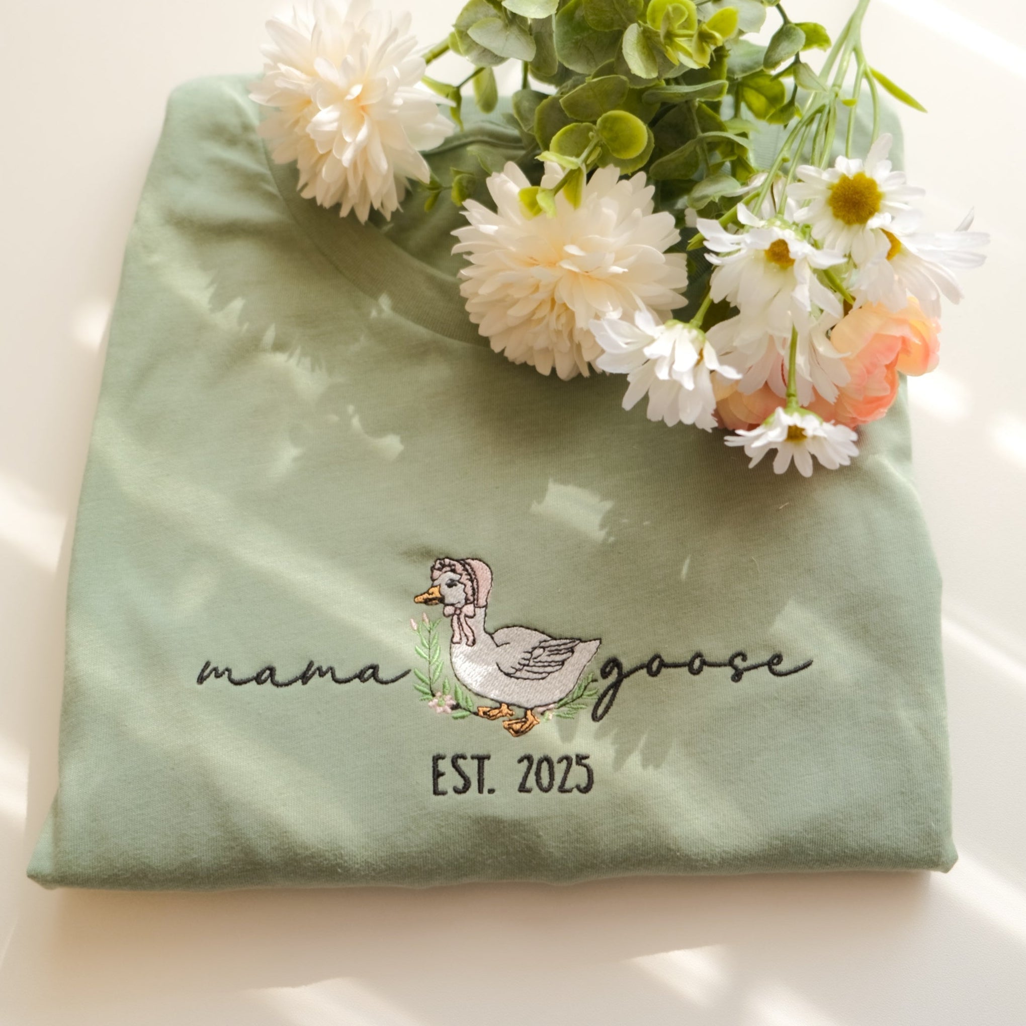 Embroidered Mama Goose on light green t shirt