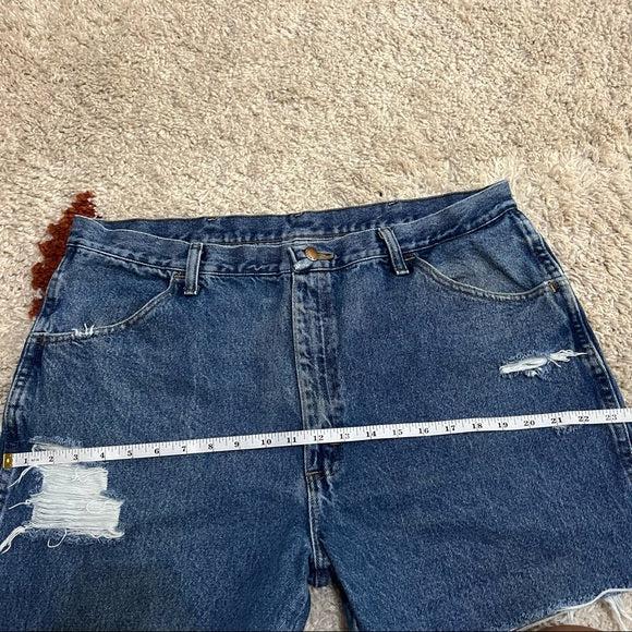 Vintage distressed high waisted denim cutoff shorts in size 36/16
